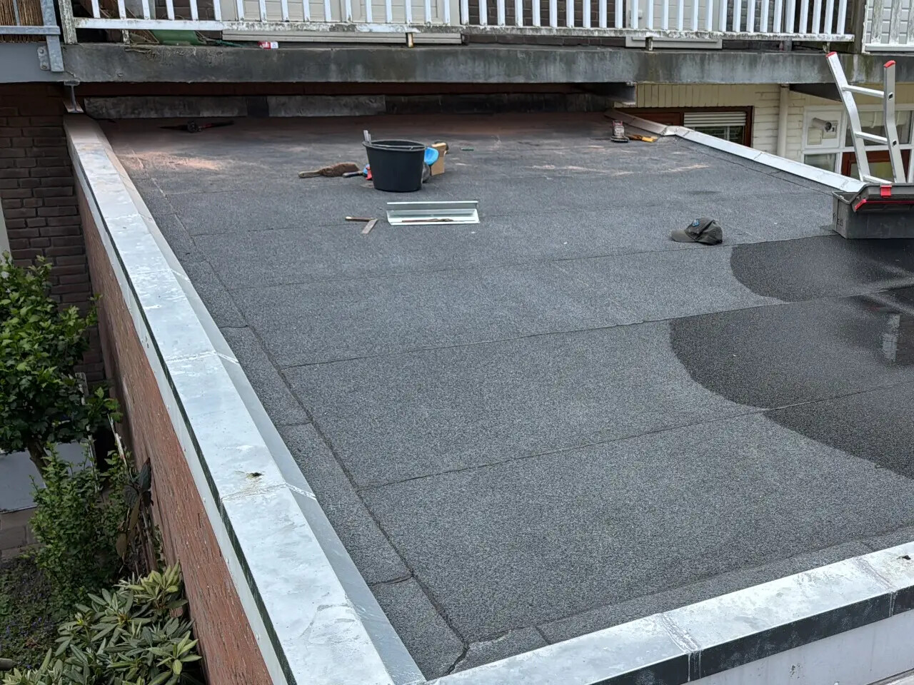 Bitumen dak vernieuwd – Leidsebuurt, Haarlem